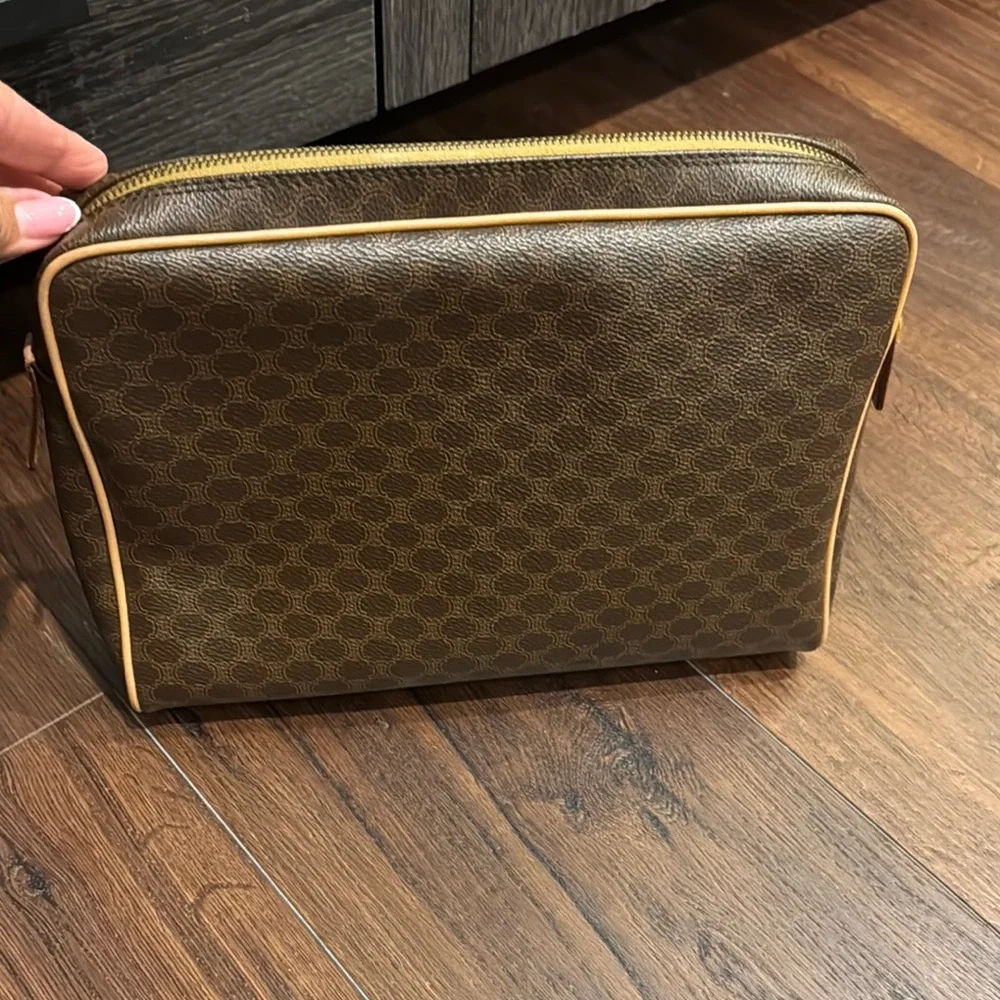 Celine Pre Owned Authentic Brown and Tan Toiletry Bag with Monogram Pattern.